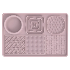 4-in-1 Multifunctional Dog Lick Mat - Reduce Boredom with Slow Feeder & Licking Zones Pink silicone 4-in-1 dog lick mat with bowl, slow feeder, and textured zones, designed to reduce boredom and improve digestion.